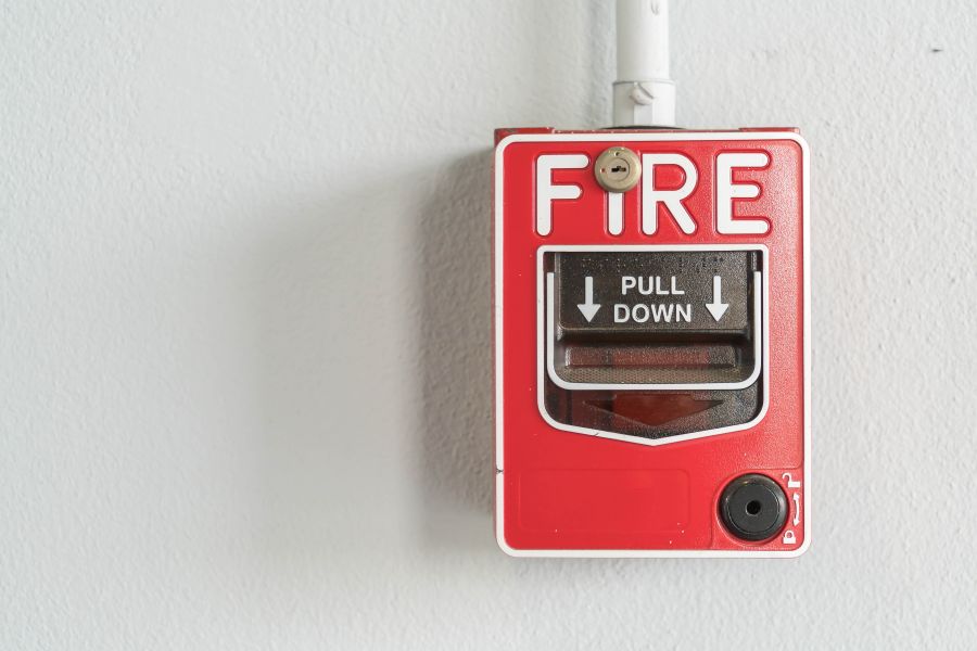 Fire alarm button installed on a wall by Apagafoc Ibiza
